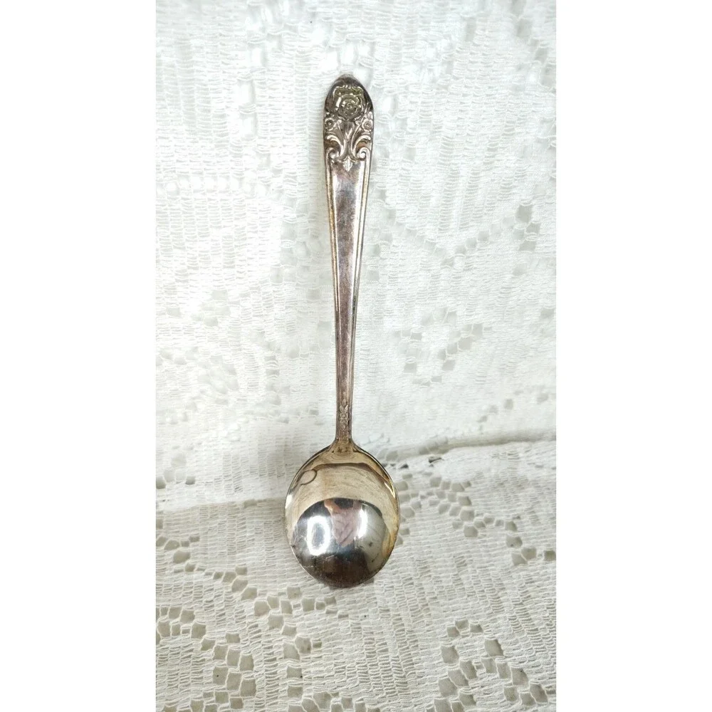Vintage International Silver Melody 1954 Silverplate Soup Spoon Floral needs...